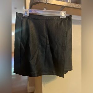 Black faux leather wrap mini skirt
